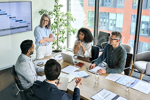 Corporate group meeting in bright conference room